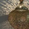 Hammered brass dome lamp